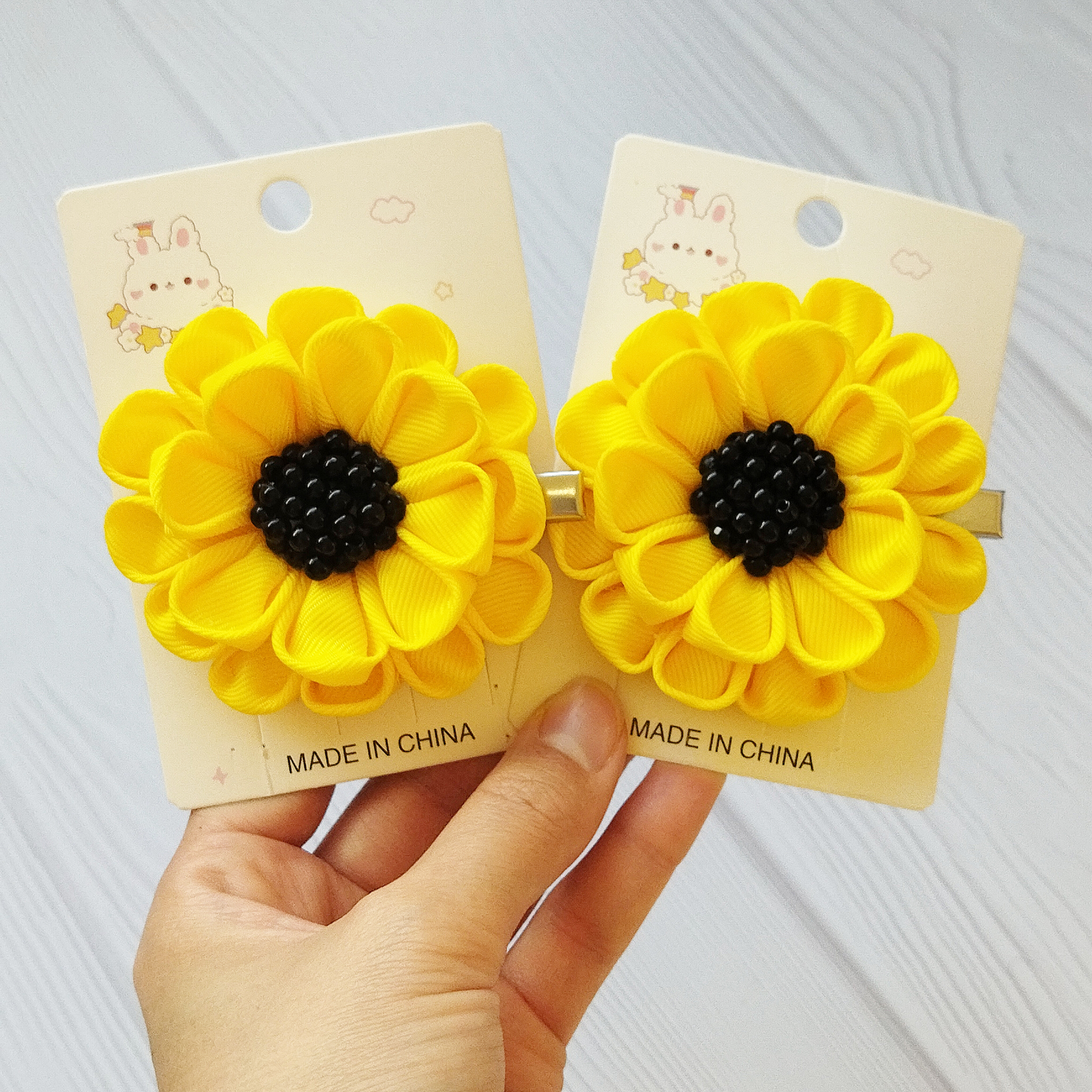 تصویر گلسر آفتابگردون دست ساز دخترانه 